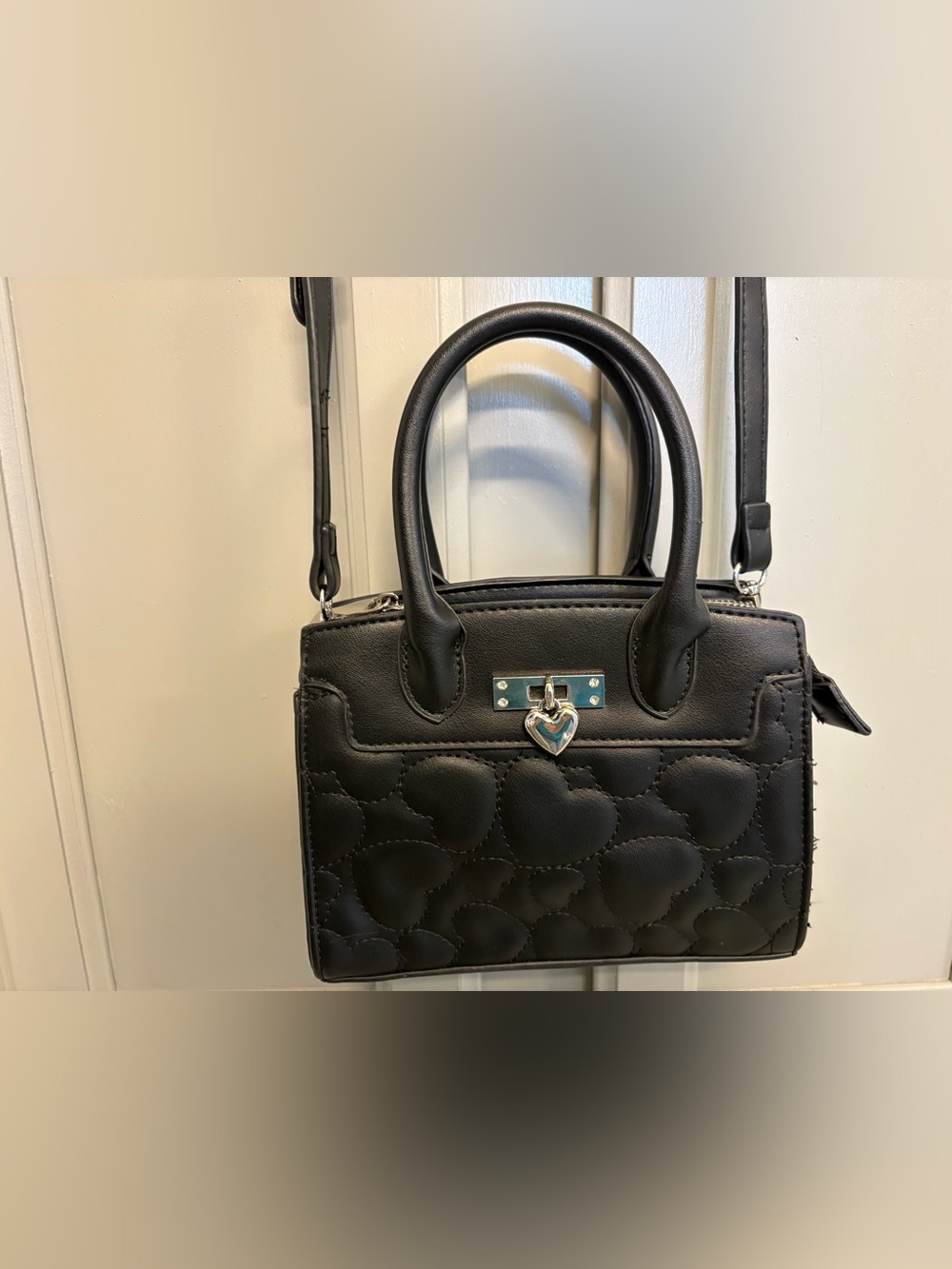 Women's Black Heart-Quilted Top-Handle Bag with Silver Heart Charm